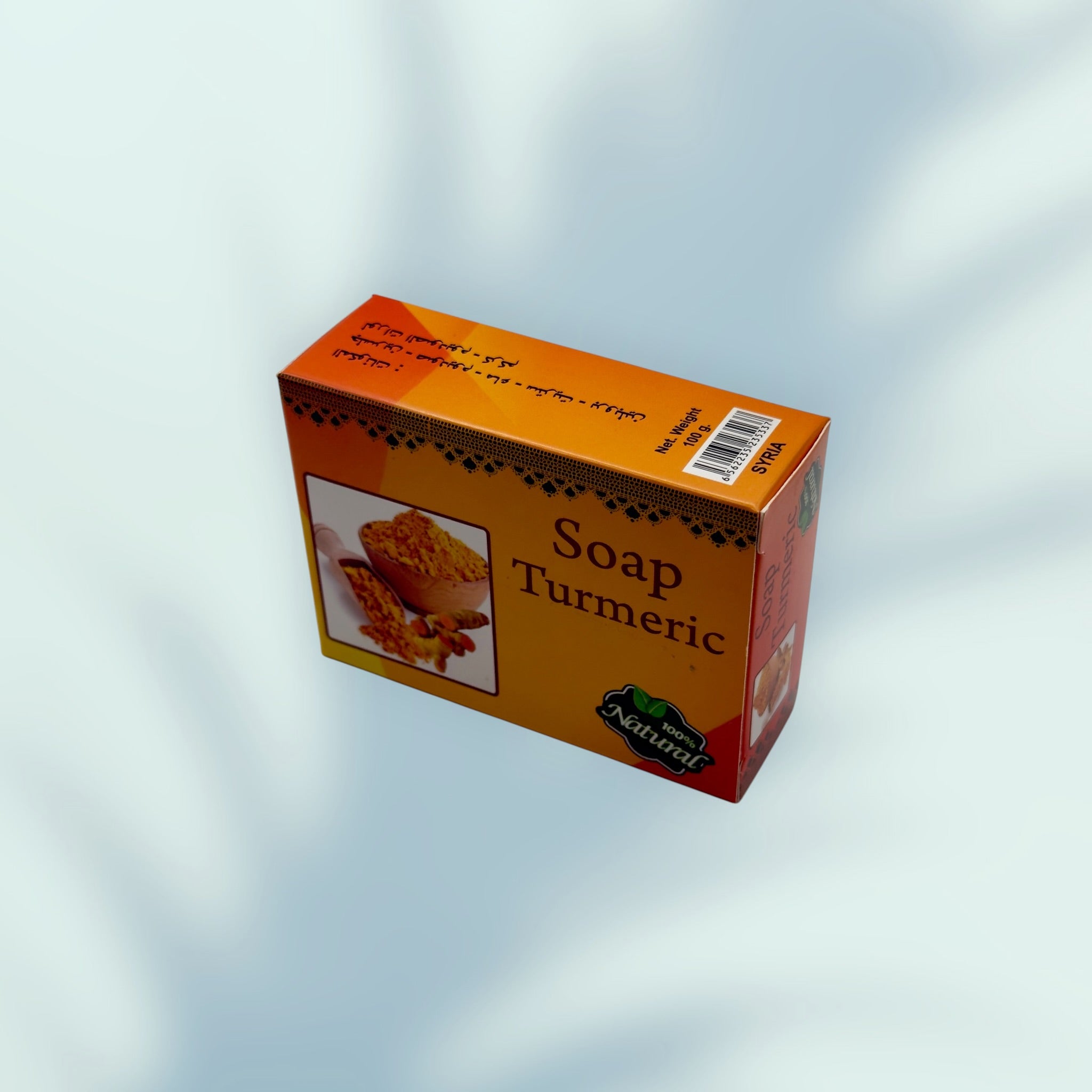 Box of Turmeric soap on a light gray background