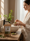 Bellanisa Natural Sidr Powder for face and body mask, green powder in a pouch and bowl, woman preparing mask.