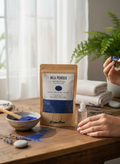 Bellanisa Nila Powder Face and Body Mask, 100% natural indigo powder for skin brightening and detoxifying. Blue powder in pouch and bowl.